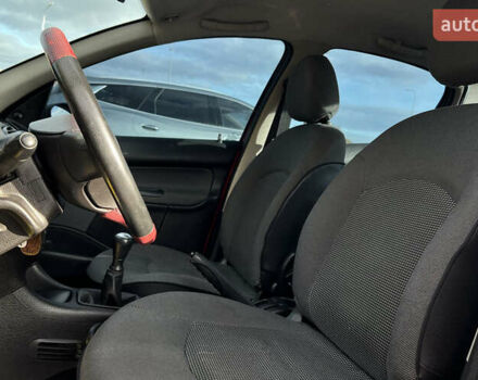 Красный Пежо 206, объемом двигателя 1.4 л и пробегом 139 тыс. км за 3999 $, фото 13 на Automoto.ua