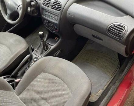 Червоний Пежо 206, об'ємом двигуна 1.4 л та пробігом 170 тис. км за 2800 $, фото 6 на Automoto.ua