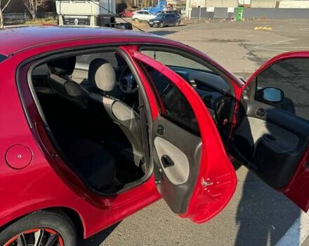 Червоний Пежо 206, об'ємом двигуна 1.36 л та пробігом 177 тис. км за 3200 $, фото 15 на Automoto.ua