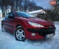 Красный Пежо 206, объемом двигателя 1.36 л и пробегом 190 тыс. км за 2999 $, фото 1 на Automoto.ua