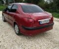 Червоний Пежо 206, об'ємом двигуна 1.4 л та пробігом 260 тис. км за 2950 $, фото 4 на Automoto.ua