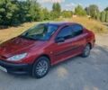 Червоний Пежо 206, об'ємом двигуна 1.36 л та пробігом 115 тис. км за 3400 $, фото 1 на Automoto.ua