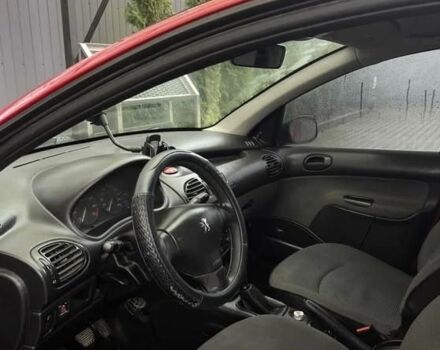 Красный Пежо 206, объемом двигателя 1.4 л и пробегом 133 тыс. км за 3500 $, фото 10 на Automoto.ua