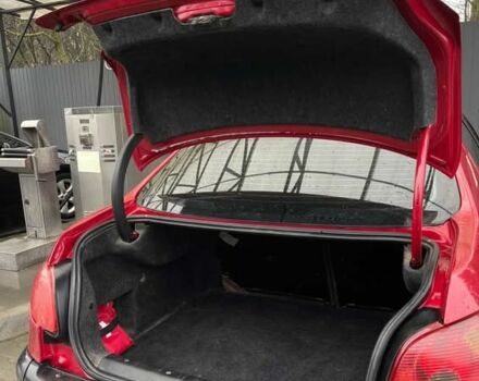 Красный Пежо 206, объемом двигателя 1.4 л и пробегом 133 тыс. км за 3500 $, фото 7 на Automoto.ua