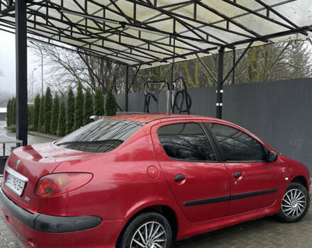 Красный Пежо 206, объемом двигателя 1.36 л и пробегом 133 тыс. км за 3800 $, фото 10 на Automoto.ua