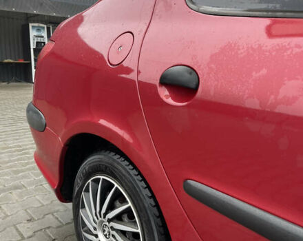 Красный Пежо 206, объемом двигателя 1.36 л и пробегом 133 тыс. км за 3800 $, фото 7 на Automoto.ua