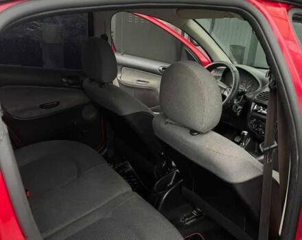 Красный Пежо 206, объемом двигателя 1.4 л и пробегом 133 тыс. км за 3500 $, фото 14 на Automoto.ua