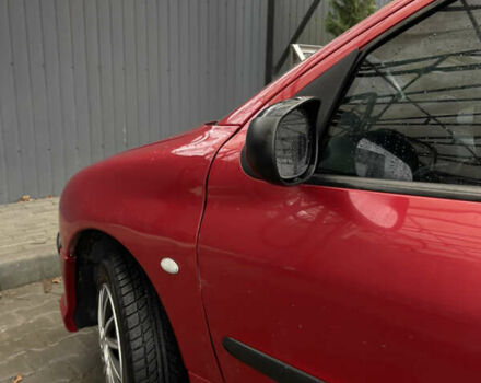 Красный Пежо 206, объемом двигателя 1.36 л и пробегом 133 тыс. км за 3800 $, фото 5 на Automoto.ua