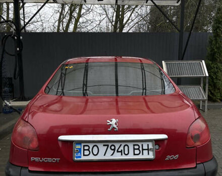 Красный Пежо 206, объемом двигателя 1.36 л и пробегом 133 тыс. км за 3800 $, фото 9 на Automoto.ua