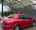 Красный Пежо 206, объемом двигателя 1.4 л и пробегом 133 тыс. км за 3500 $, фото 2 на Automoto.ua