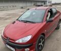 Красный Пежо 206, объемом двигателя 1.4 л и пробегом 102 тыс. км за 3500 $, фото 1 на Automoto.ua