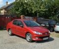 Красный Пежо 206, объемом двигателя 1.6 л и пробегом 87 тыс. км за 5500 $, фото 1 на Automoto.ua