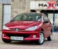 Красный Пежо 206, объемом двигателя 1.59 л и пробегом 89 тыс. км за 6800 $, фото 1 на Automoto.ua