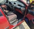 Червоний Пежо 206, об'ємом двигуна 1.1 л та пробігом 230 тис. км за 750 $, фото 11 на Automoto.ua