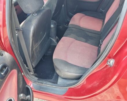 Червоний Пежо 206, об'ємом двигуна 1.1 л та пробігом 230 тис. км за 750 $, фото 9 на Automoto.ua