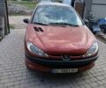 Красный Пежо 206, объемом двигателя 1.12 л и пробегом 267 тыс. км за 2400 $, фото 1 на Automoto.ua