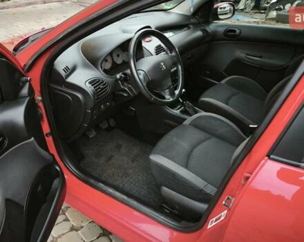 Червоний Пежо 206, об'ємом двигуна 1.4 л та пробігом 286 тис. км за 4250 $, фото 32 на Automoto.ua