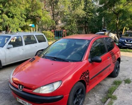 Червоний Пежо 206, об'ємом двигуна 1.2 л та пробігом 250 тис. км за 1599 $, фото 1 на Automoto.ua