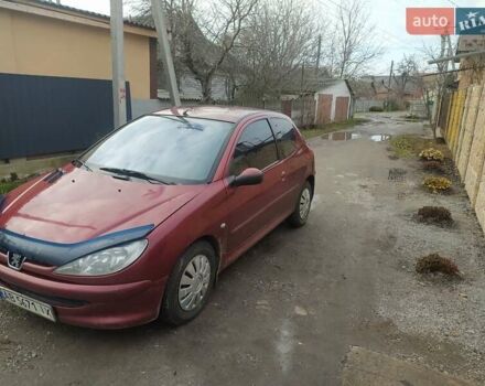 Красный Пежо 206, объемом двигателя 1.87 л и пробегом 315 тыс. км за 2700 $, фото 1 на Automoto.ua