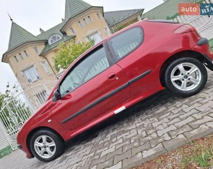 Червоний Пежо 206, об'ємом двигуна 1.4 л та пробігом 229 тис. км за 2100 $, фото 1 на Automoto.ua