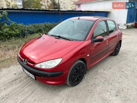 Червоний Пежо 206, об'ємом двигуна 1.36 л та пробігом 195 тис. км за 3700 $, фото 1 на Automoto.ua
