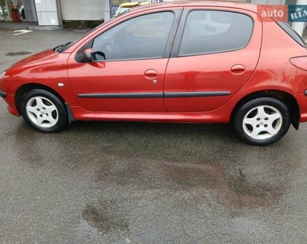 Красный Пежо 206, объемом двигателя 1.4 л и пробегом 231 тыс. км за 3400 $, фото 1 на Automoto.ua