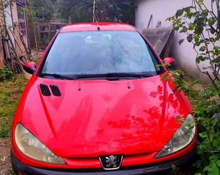 Красный Пежо 206, объемом двигателя 1.4 л и пробегом 211 тыс. км за 3000 $, фото 1 на Automoto.ua