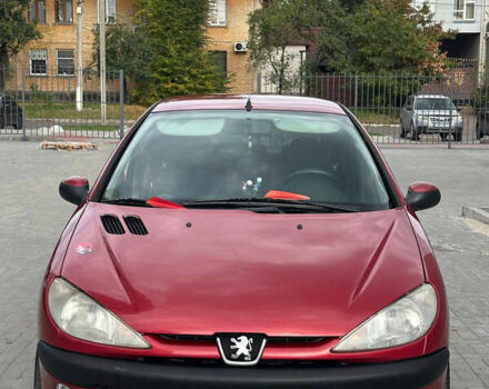Красный Пежо 206, объемом двигателя 1.59 л и пробегом 195 тыс. км за 3800 $, фото 1 на Automoto.ua