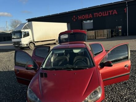Красный Пежо 206, объемом двигателя 1.4 л и пробегом 165 тыс. км за 2850 $, фото 1 на Automoto.ua