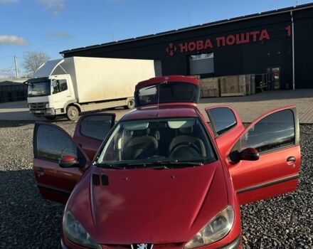 Красный Пежо 206, объемом двигателя 1.4 л и пробегом 165 тыс. км за 2850 $, фото 1 на Automoto.ua