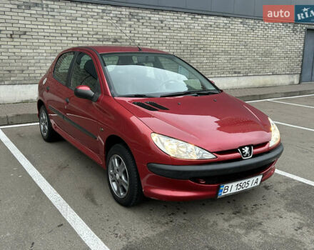 Красный Пежо 206, объемом двигателя 1.4 л и пробегом 76 тыс. км за 5200 $, фото 1 на Automoto.ua