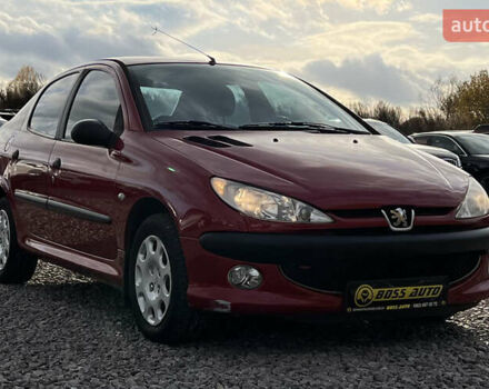 Красный Пежо 206, объемом двигателя 1.4 л и пробегом 139 тыс. км за 3999 $, фото 1 на Automoto.ua