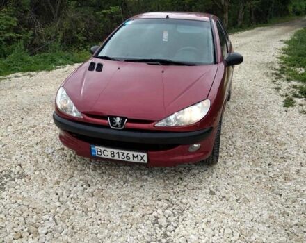 Красный Пежо 206, объемом двигателя 1.4 л и пробегом 260 тыс. км за 2950 $, фото 1 на Automoto.ua
