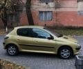 Желтый Пежо 206, объемом двигателя 1.4 л и пробегом 212 тыс. км за 3340 $, фото 9 на Automoto.ua