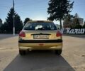 Желтый Пежо 206, объемом двигателя 1.12 л и пробегом 181 тыс. км за 2500 $, фото 3 на Automoto.ua