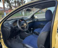 Желтый Пежо 206, объемом двигателя 1.12 л и пробегом 181 тыс. км за 2500 $, фото 17 на Automoto.ua