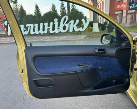 Желтый Пежо 206, объемом двигателя 1.12 л и пробегом 181 тыс. км за 2500 $, фото 18 на Automoto.ua