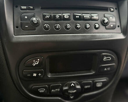 Желтый Пежо 206, объемом двигателя 1.36 л и пробегом 209 тыс. км за 3199 $, фото 13 на Automoto.ua