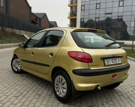 Желтый Пежо 206, объемом двигателя 1.36 л и пробегом 209 тыс. км за 3199 $, фото 4 на Automoto.ua