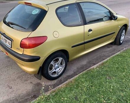 Желтый Пежо 206, объемом двигателя 1.4 л и пробегом 150 тыс. км за 3000 $, фото 5 на Automoto.ua