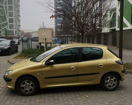 Желтый Пежо 206, объемом двигателя 1.4 л и пробегом 212 тыс. км за 3340 $, фото 10 на Automoto.ua