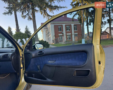 Желтый Пежо 206, объемом двигателя 1.12 л и пробегом 181 тыс. км за 2500 $, фото 20 на Automoto.ua