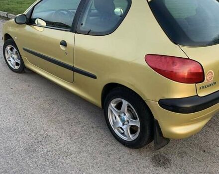 Желтый Пежо 206, объемом двигателя 1.4 л и пробегом 150 тыс. км за 3000 $, фото 2 на Automoto.ua