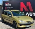 Желтый Пежо 206, объемом двигателя 1.59 л и пробегом 313 тыс. км за 2200 $, фото 1 на Automoto.ua