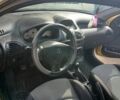 Жовтий Пежо 206, об'ємом двигуна 1.4 л та пробігом 263 тис. км за 2650 $, фото 5 на Automoto.ua