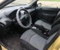 Жовтий Пежо 206, об'ємом двигуна 1.4 л та пробігом 200 тис. км за 3000 $, фото 9 на Automoto.ua