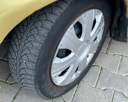 Желтый Пежо 206, объемом двигателя 2 л и пробегом 250 тыс. км за 2499 $, фото 1 на Automoto.ua