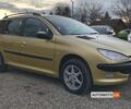Желтый Пежо 206, объемом двигателя 1.4 л и пробегом 352 тыс. км за 3100 $, фото 1 на Automoto.ua