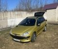 Желтый Пежо 206, объемом двигателя 1.6 л и пробегом 257 тыс. км за 3800 $, фото 1 на Automoto.ua