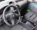 Серый Пежо 206, объемом двигателя 1.1 л и пробегом 205 тыс. км за 2600 $, фото 4 на Automoto.ua